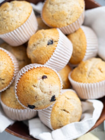 Blueberry muffins in a bowl.